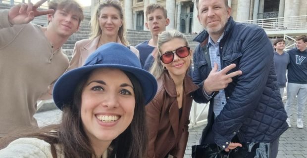 Happy clients in St. Peter's Square, Rome, Italy