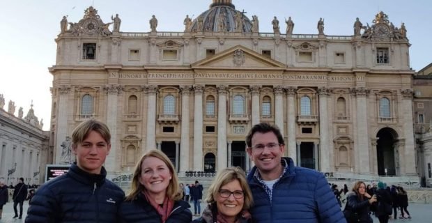 Happy family clients in St. Peter's Square Vatican City, Rome, Italy