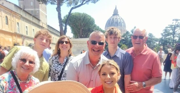 multi-generational family in the splendid Vatican setting in Rome, Italy